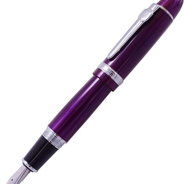 Fountain Pen: Bent nib; purple lacquer finish with silver trim; features a substantial, heavyweight body; includes a protective sleeve and ink converter.